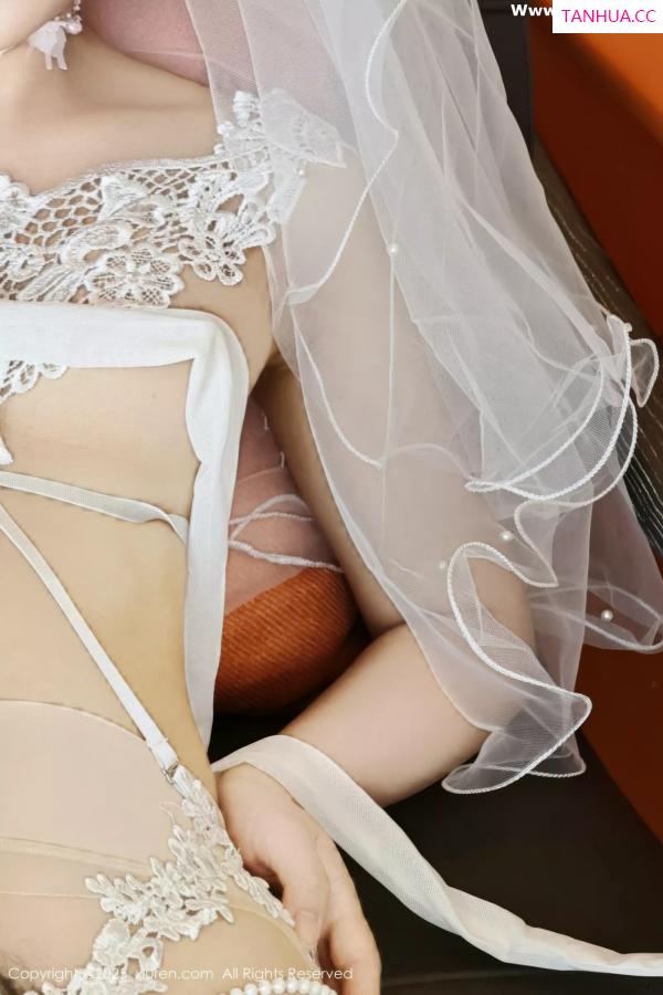   [XiuRen]高清写真图 2025.07.18 No.10559 糯梨子 白色婚纱第13张图片